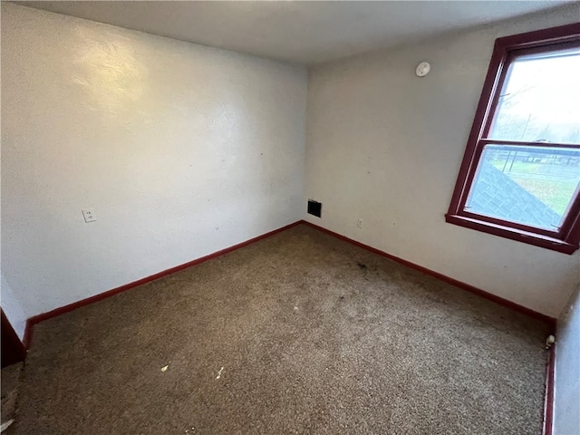 view of carpeted spare room