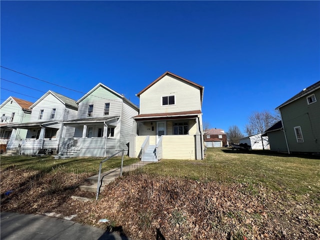 view of front of home with a front lawn