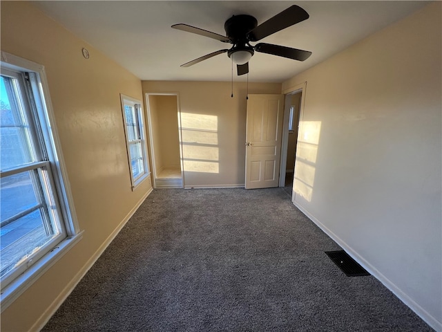 interior space with plenty of natural light and ceiling fan