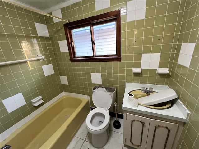 full bathroom with tile patterned flooring, toilet, vanity, and tile walls