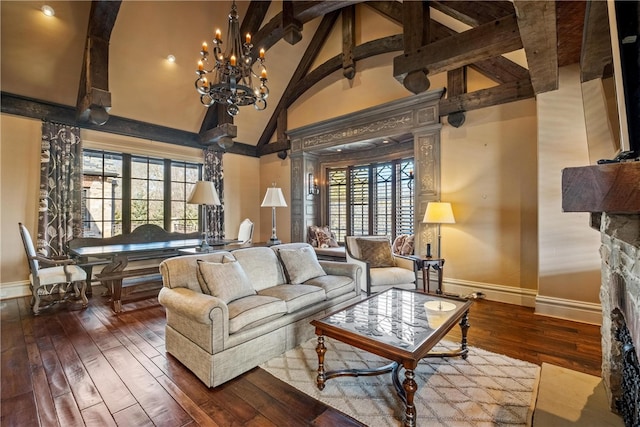 living room featuring a fireplace, a chandelier, high vaulted ceiling, hardwood / wood-style floors, and beam ceiling