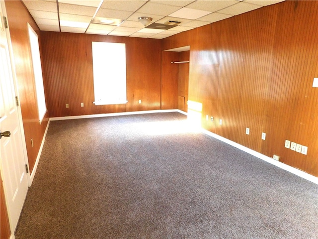 unfurnished room with carpet floors