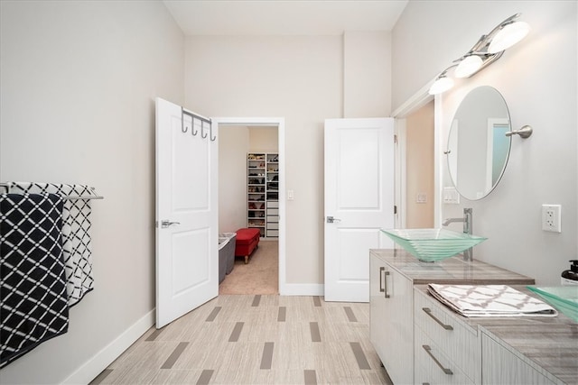 bathroom featuring oversized vanity