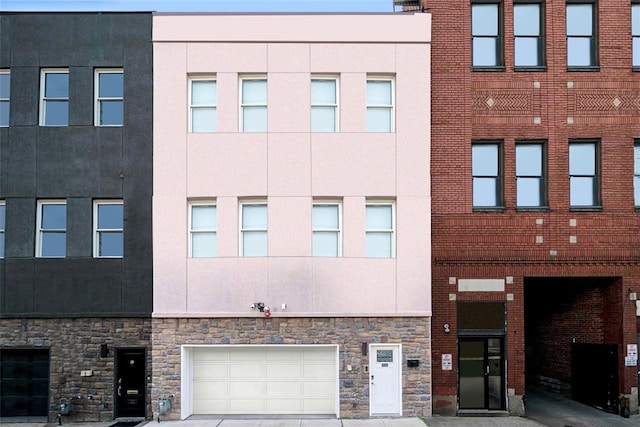 view of building exterior with a garage