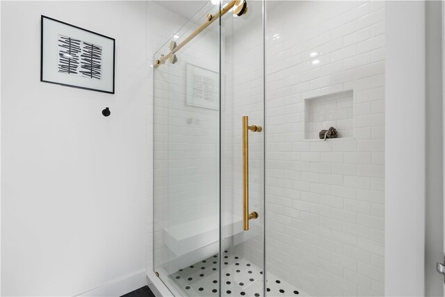 bathroom with an enclosed shower