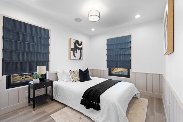 bedroom with light hardwood / wood-style floors