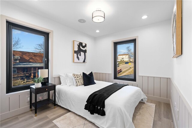 bedroom with light hardwood / wood-style flooring