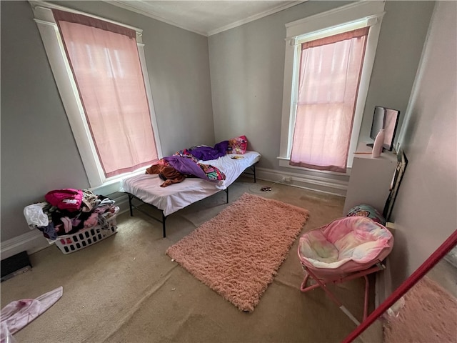 bedroom featuring multiple windows and crown molding