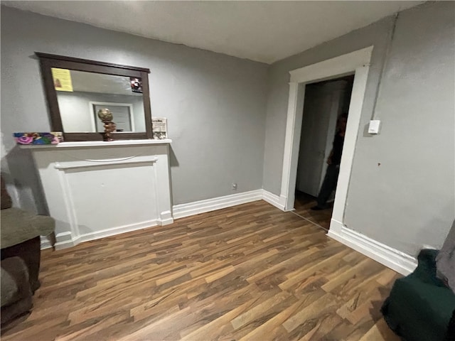 living room featuring dark wood-type flooring