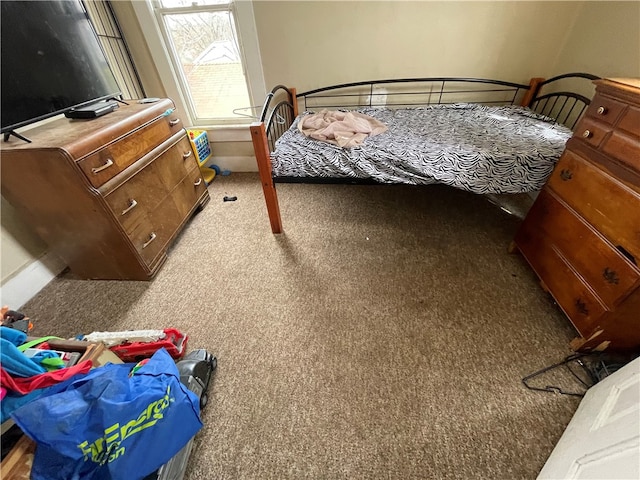 bedroom featuring carpet flooring