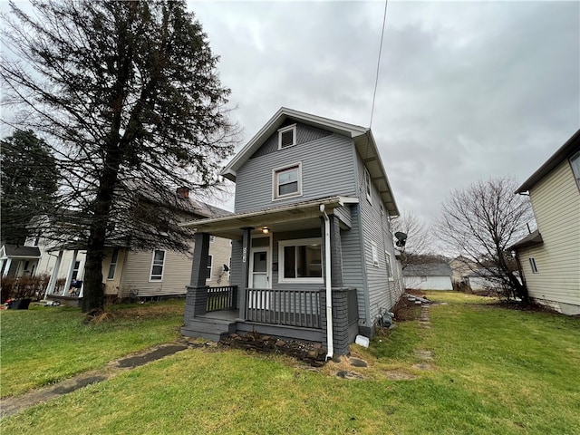 view of front of house featuring a front yard and a porch