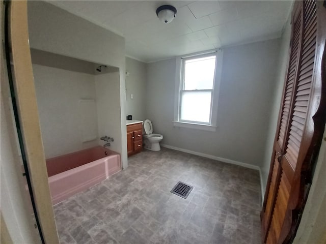 full bathroom with vanity, washtub / shower combination, and toilet