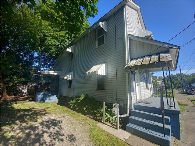 1112 Pollock Ave, New Castle/5Th, PA 16101 - view of property exterior featuring board and batten siding