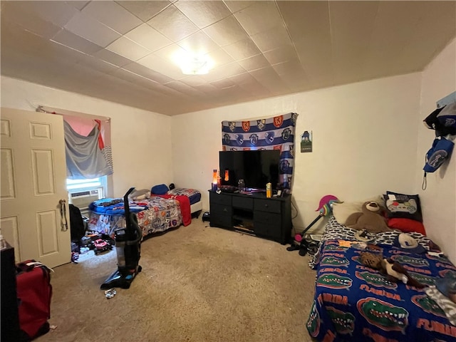 carpeted bedroom featuring cooling unit