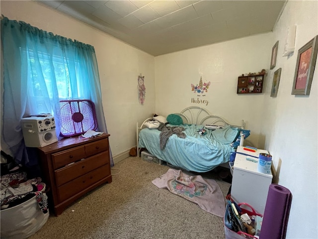 bedroom featuring carpet