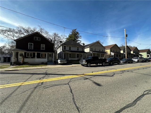 view of front of home with a residential view