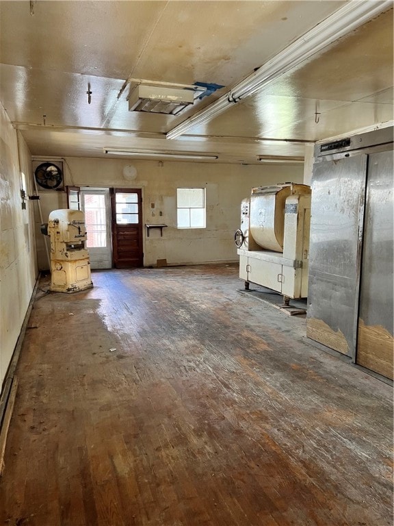 basement featuring dark wood-type flooring