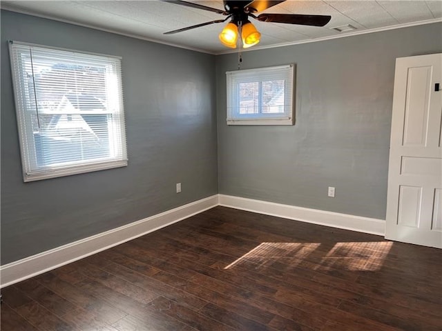 spare room featuring ornamental molding, wood-type flooring, and ceiling fan