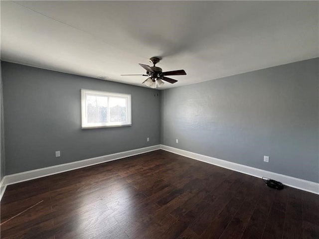 empty room with wood-type flooring and ceiling fan