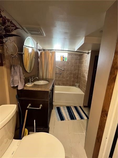 full bathroom featuring vanity, shower / bathtub combination with curtain, toilet, and tile flooring