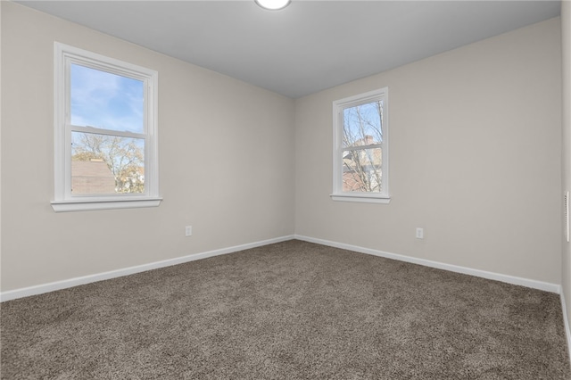 view of carpeted spare room