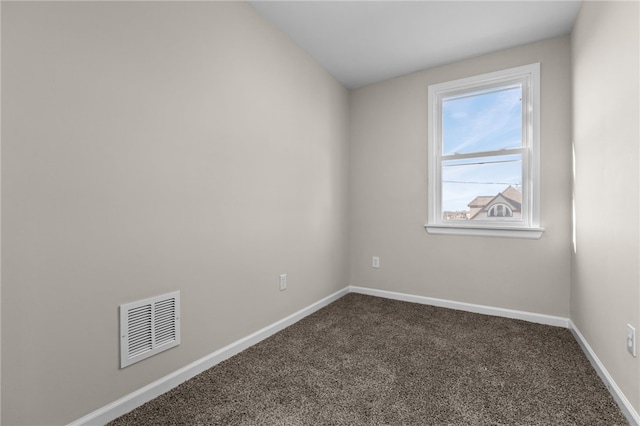 unfurnished room with carpet flooring