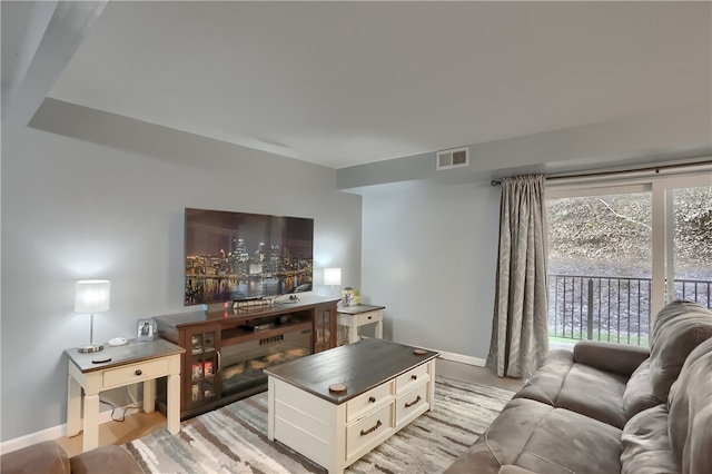 living room with light hardwood / wood-style floors