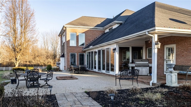 back of house featuring a patio