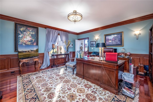 home office with crown molding and dark hardwood / wood-style flooring