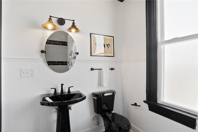 bathroom with toilet and sink