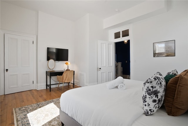 bedroom featuring hardwood / wood-style floors