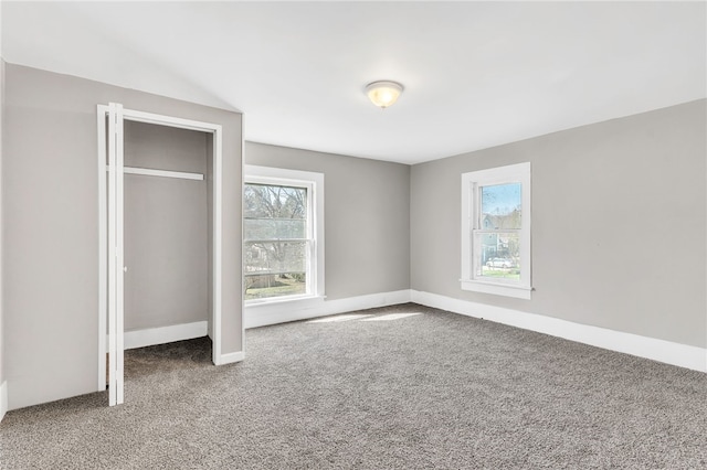 unfurnished bedroom featuring carpet flooring