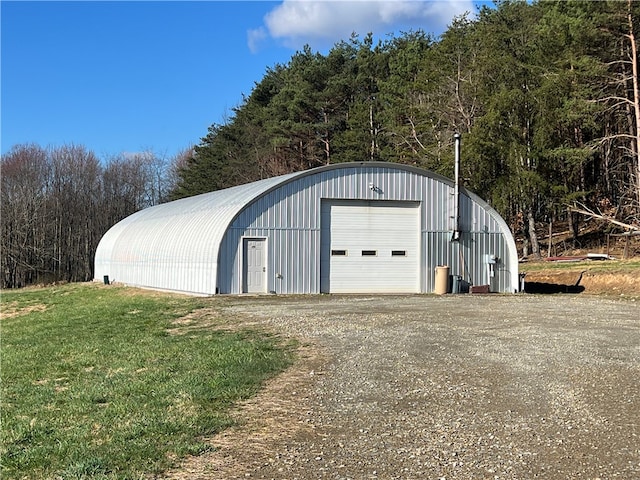 garage with a lawn