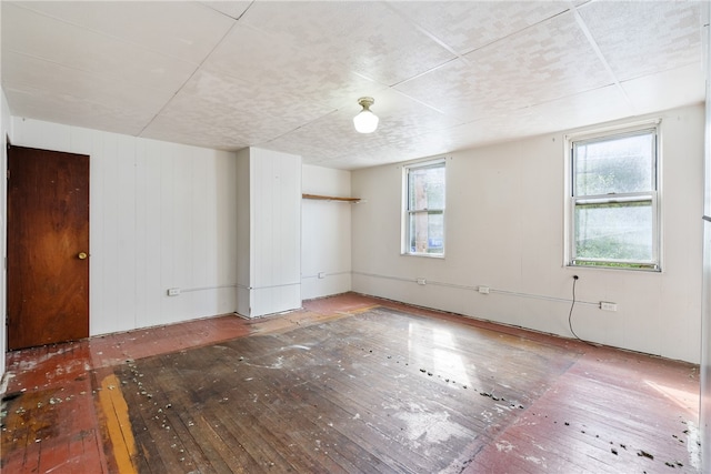 unfurnished room featuring hardwood / wood-style floors