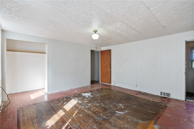 empty room featuring hardwood / wood-style floors