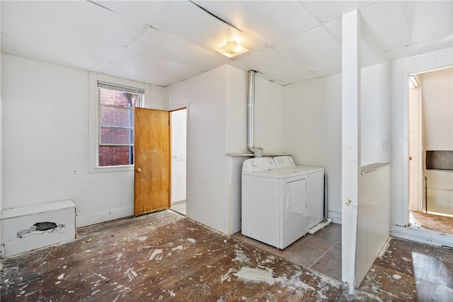 washroom with independent washer and dryer