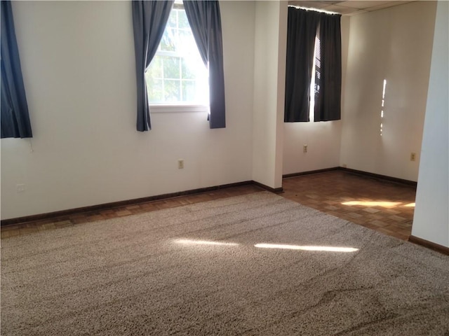 empty room featuring parquet floors