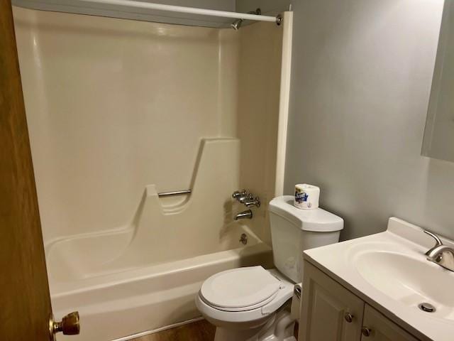 full bathroom with vanity, shower / bath combination, and toilet