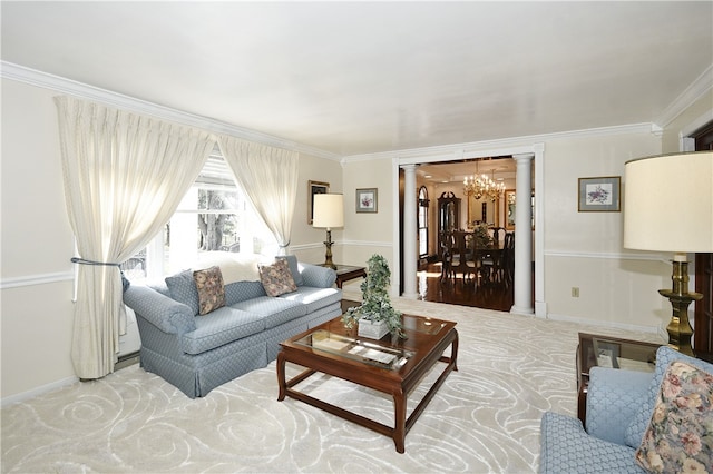 living room featuring a notable chandelier, ornamental molding, light colored carpet, and ornate columns