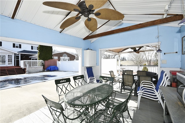 interior space with a deck and ceiling fan