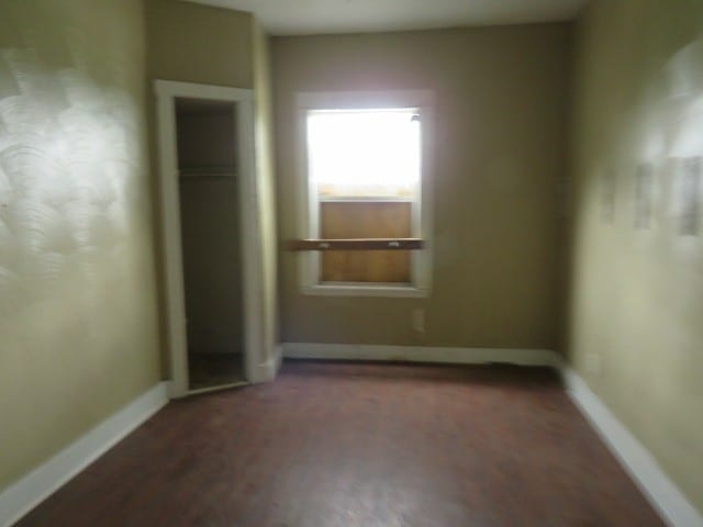 unfurnished bedroom with a closet