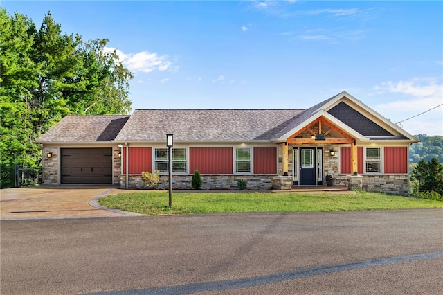 view of front of house with a garage and covered porch