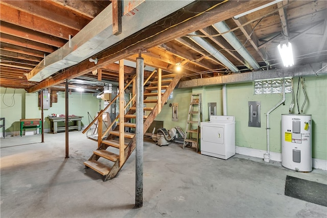 basement with washer / clothes dryer and water heater