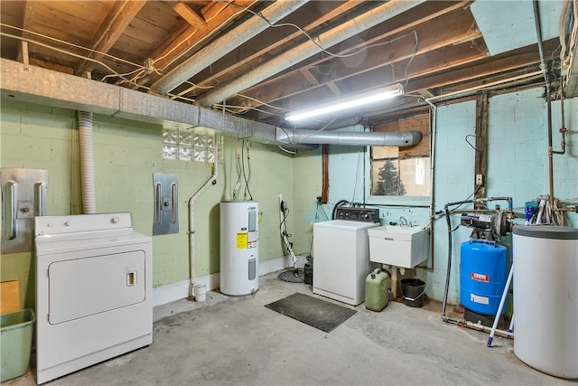 basement featuring water heater, separate washer and dryer, sink, and gas water heater