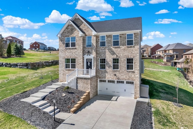 view of front facade featuring a front yard and a garage