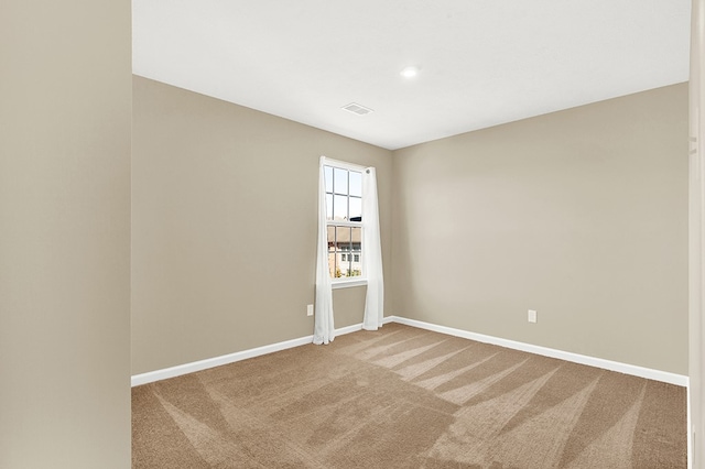 unfurnished room with carpet