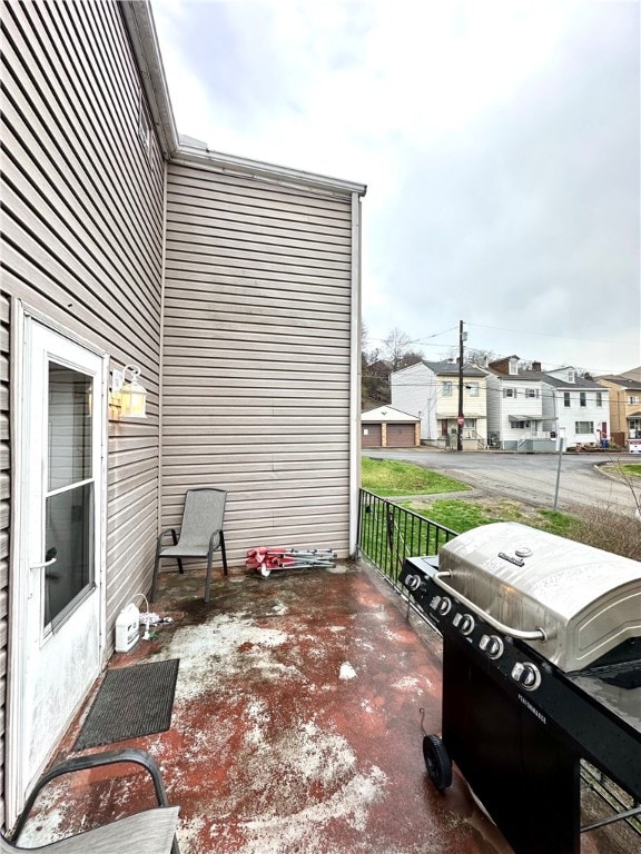 view of patio with a balcony