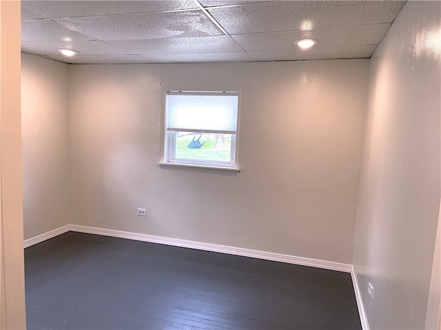 empty room with a paneled ceiling