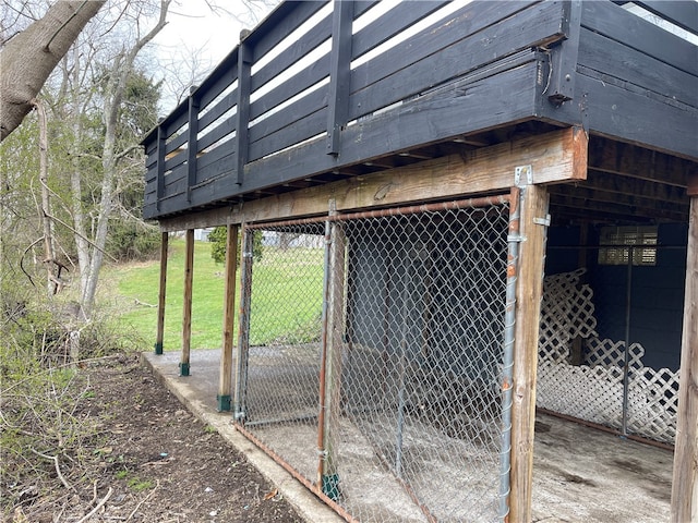 view of gate featuring a lawn