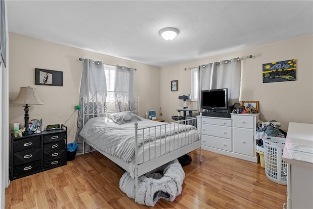 bedroom featuring light hardwood / wood-style floors